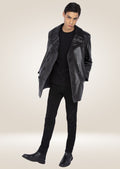 Black cowhide leather pea coat with double-breasted buttons and a sleek, rugged design for men.