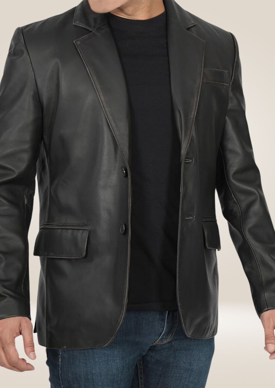 Men's black two-button leather blazer with a sleek, modern cut, offering a refined and stylish look.