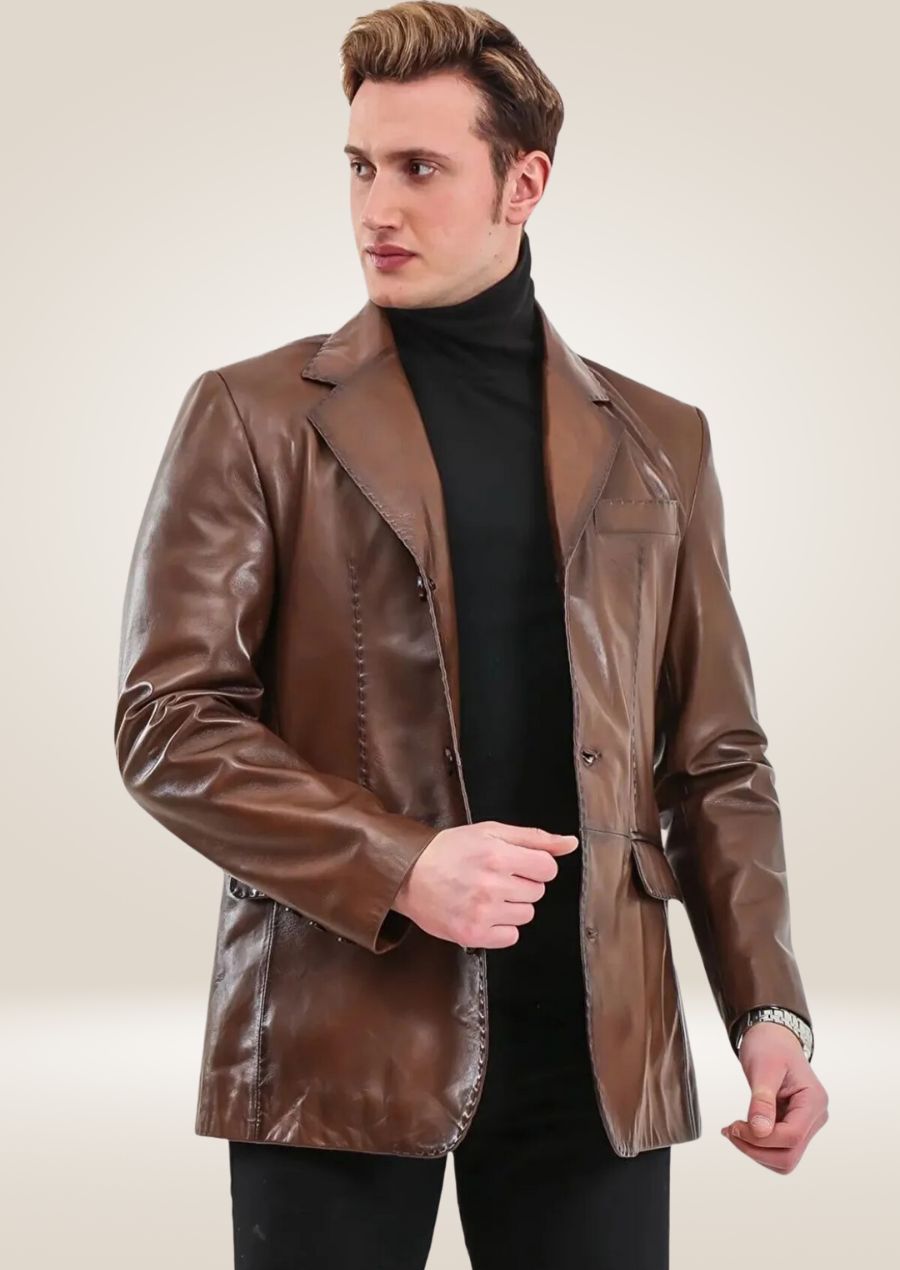 Men's brown waxed leather blazer with a sleek, tailored fit, combining genuine sophistication with rugged elegance.