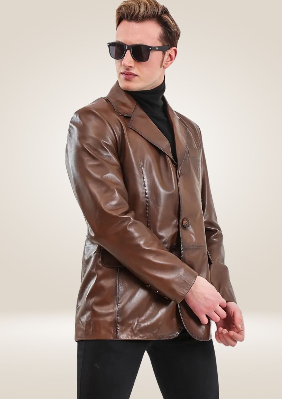 Men's brown waxed leather blazer with a sleek, tailored fit, combining genuine sophistication with rugged elegance.