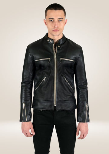 Men’s sleek black leather jacket with front zipper closure and zippered pockets, minimalist modern design.