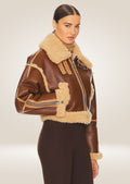 side pose of Chic Women's Brown Shearling Jacket with Cropped Design and Premium Leather